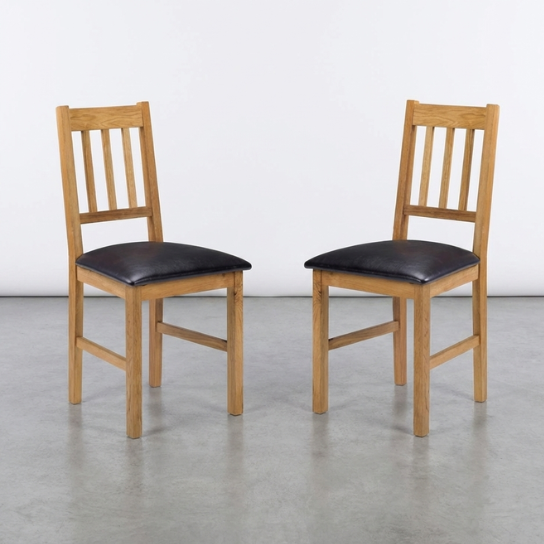 Carmel Dining Chairs with cushioned seat and vertical slatted backrest on a white background