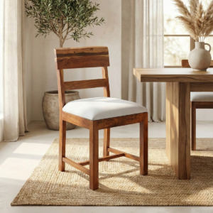 1 Acacia wood dining chair with live edge wooden backrest and cushioned seat placed beside a wooden dining table